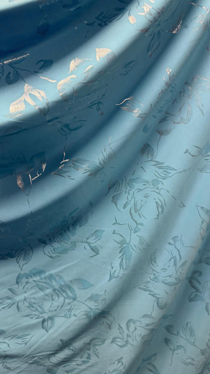 New metallic flower design on poly spandex  medium weight 2-way stretch 58/60” Sold by the YD. Ships worldwide from Los Angeles California