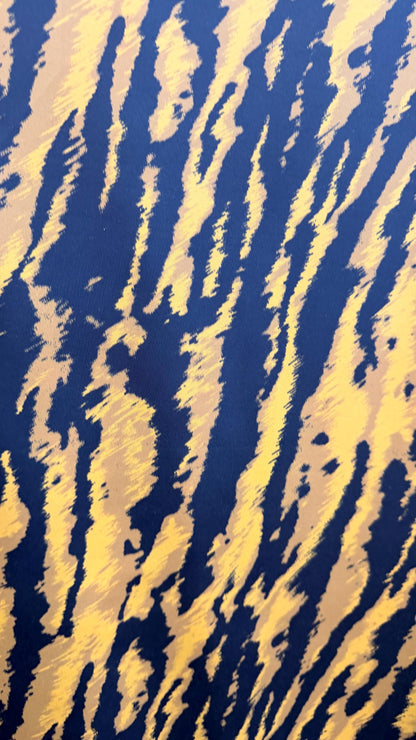 New Exotic Tiger design Gold/ black print on nylon spandex 4way stretch 58/60" Sold by the YD. Ships worldwide from Los Angeles California