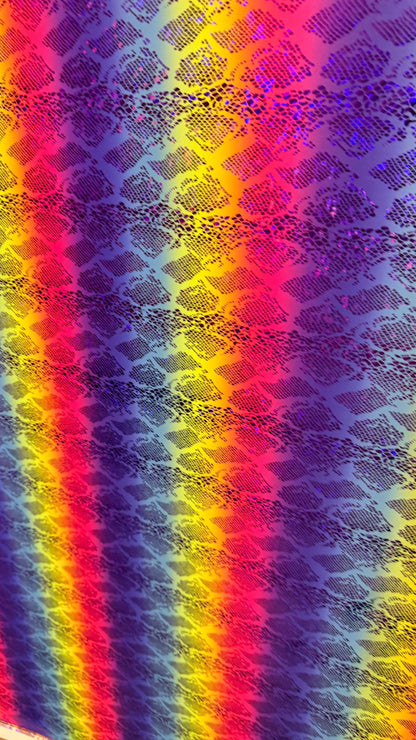 New Iridescent rainbow hologram snake design with  ilusión foil metallic nylon spandex  4way stretch 58/60" Sold by the YD. Ships worldwide