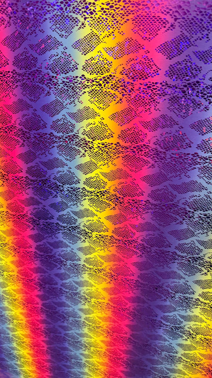 New Iridescent rainbow hologram snake design with  ilusión foil metallic nylon spandex  4way stretch 58/60" Sold by the YD. Ships worldwide