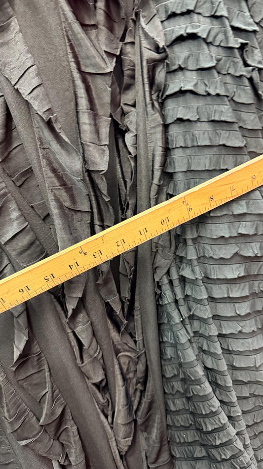 Ruffles design 1” and 2”  black/black  ruffle poly spandex 4-way stretch 55/57” Sold by the YD.