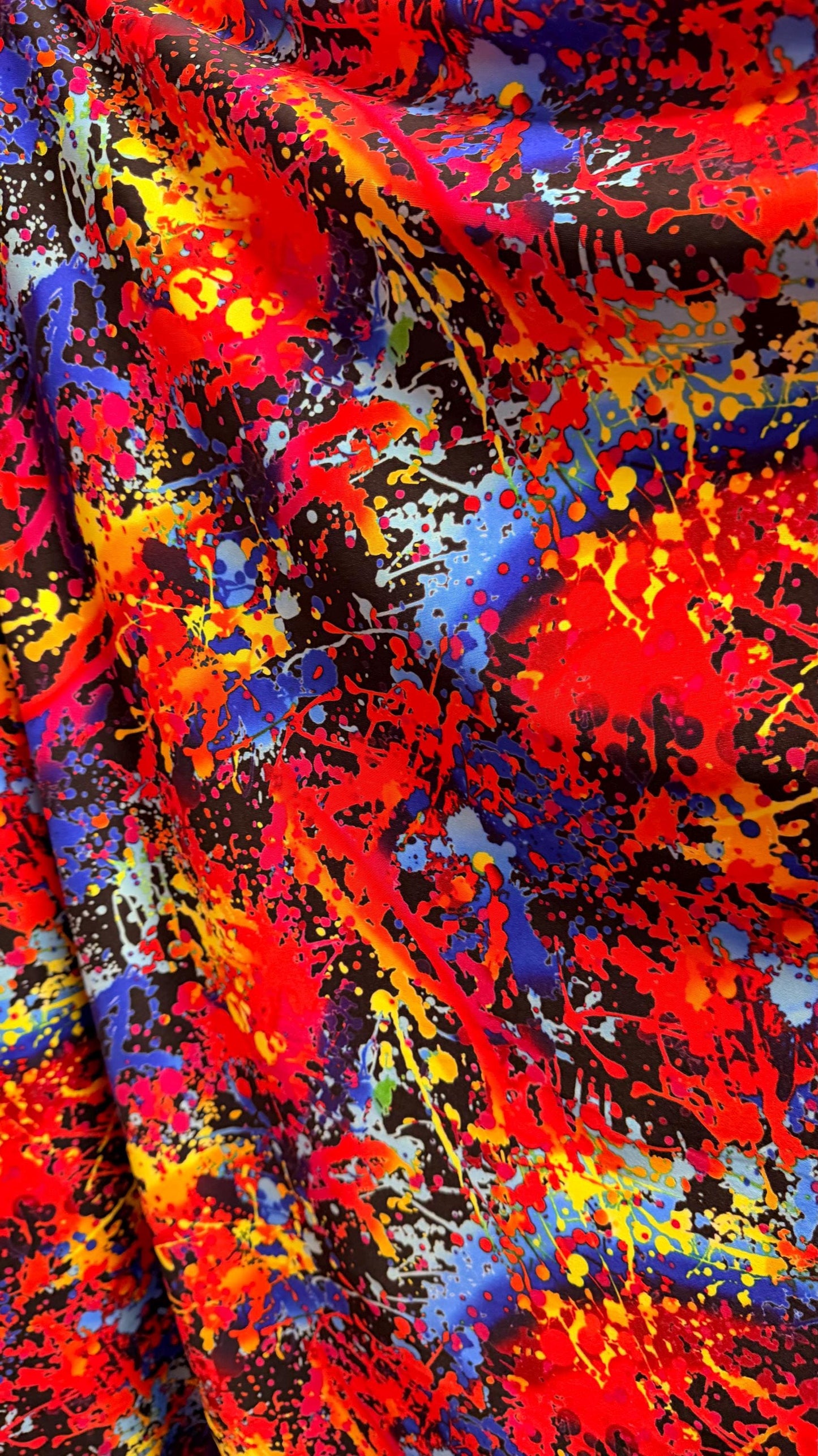 Graffiti paint design Black multicolor nylon spandex 4way Stretch 58/60" Sold by the YD. Ships worldwide from Los Angeles California USA.