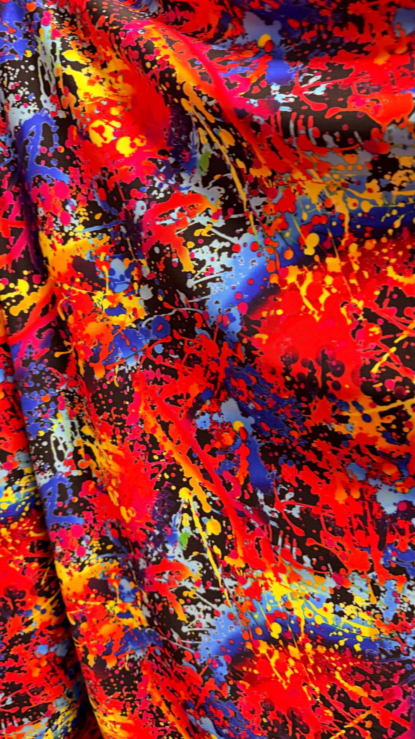 Graffiti paint design Black multicolor nylon spandex 4way Stretch 58/60" Sold by the YD. Ships worldwide from Los Angeles California USA.