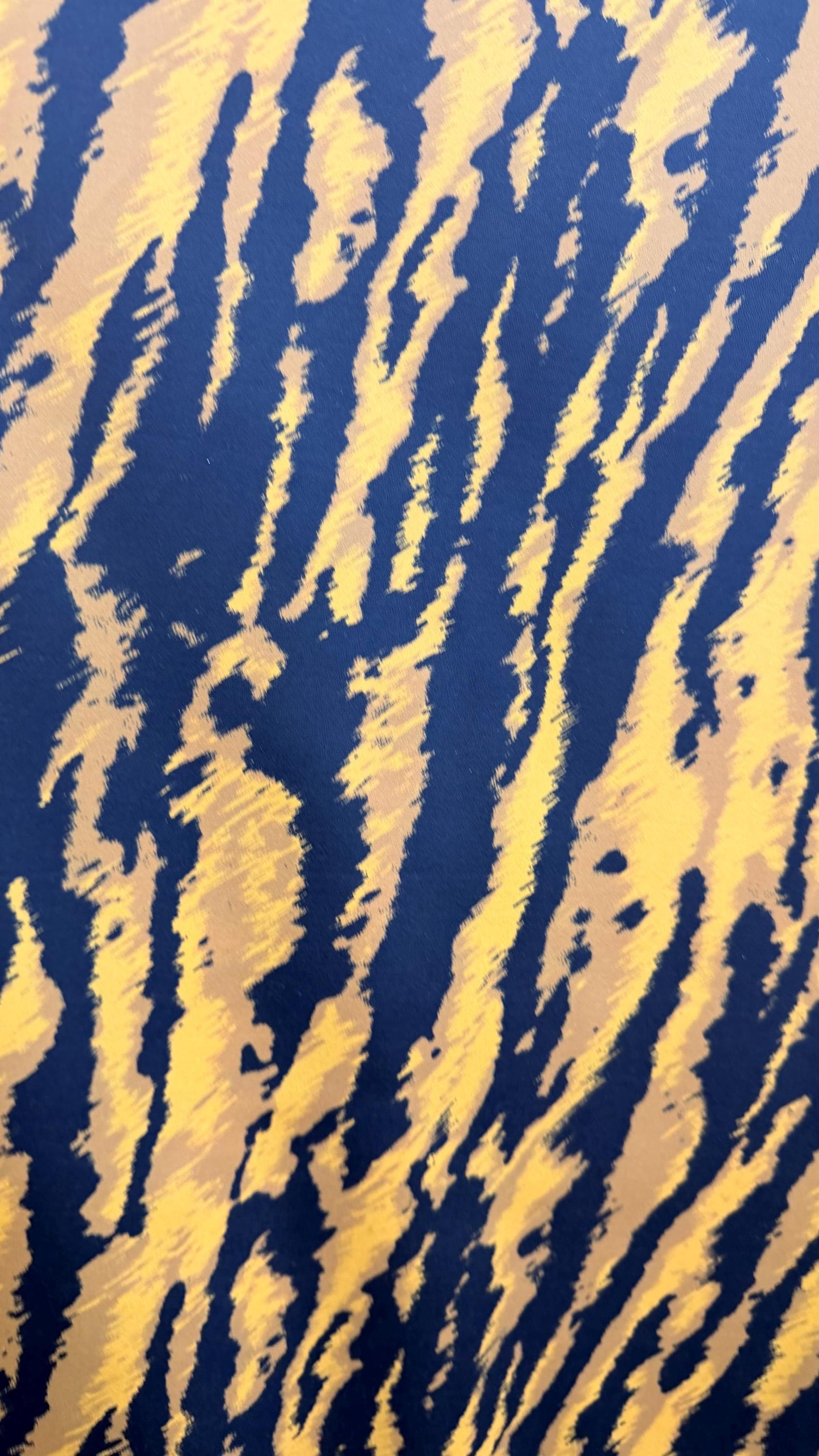 New Exotic Tiger design Gold/ black print on nylon spandex 4way stretch 58/60" Sold by the YD. Ships worldwide from Los Angeles California