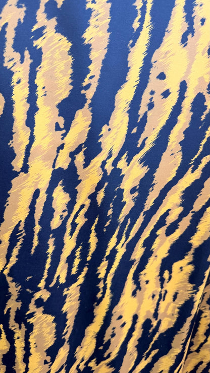 New Exotic Tiger design Gold/ black print on nylon spandex 4way stretch 58/60" Sold by the YD. Ships worldwide from Los Angeles California