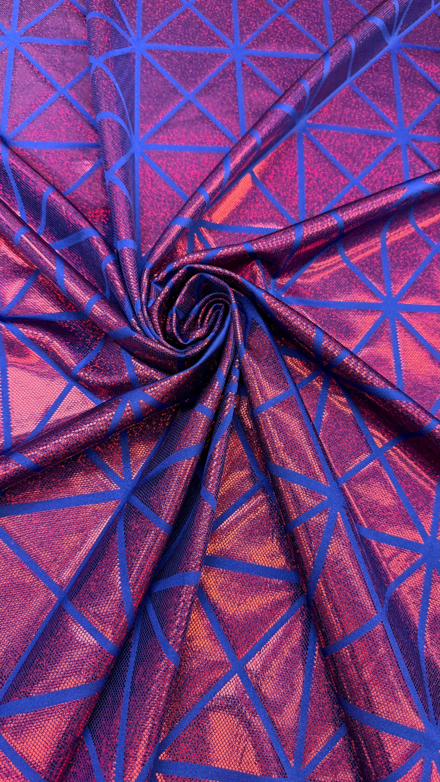 Geometric desing hologram metallic nylon spandex 4-way stretch 58/60" sold by the yd. Ships worldwide from Los Angeles California USA