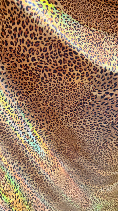 New Exotic cheetah  design Iridescent metallic hologram nylon spandex 4-way spandex 58/60” Sold by the YD. Ships worldwide from Los Angeles