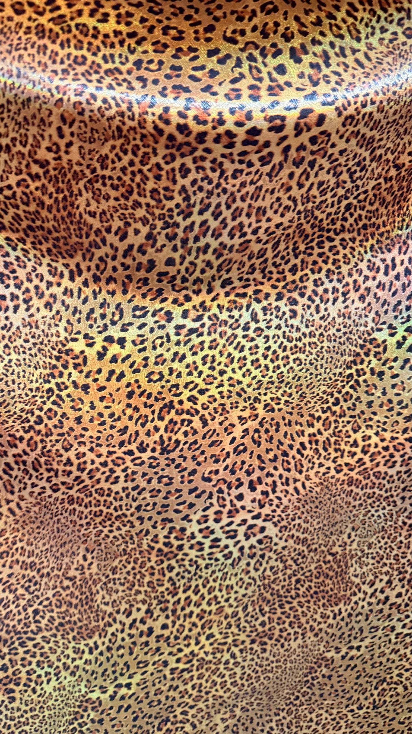 New Exotic cheetah  design Iridescent metallic hologram nylon spandex 4-way spandex 58/60” Sold by the YD. Ships worldwide from Los Angeles