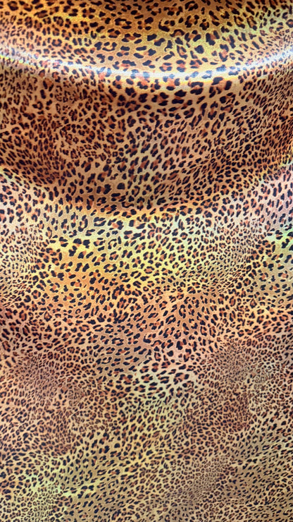 New Exotic cheetah  design Iridescent metallic hologram nylon spandex 4-way spandex 58/60” Sold by the YD. Ships worldwide from Los Angeles