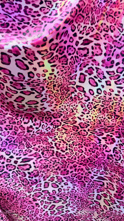 New exotic Iridescent Pug Leopard design hologram nylon spandex 4-way stretch 58/60” Sold by the YD. Ships worldwide from Los Angeles CA