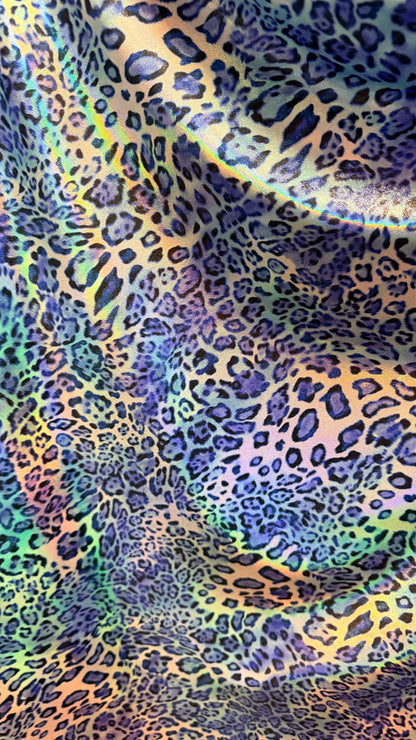 New exotic Iridescent Pug Leopard design hologram nylon spandex 4-way stretch 58/60” Sold by the YD. Ships worldwide from Los Angeles CA