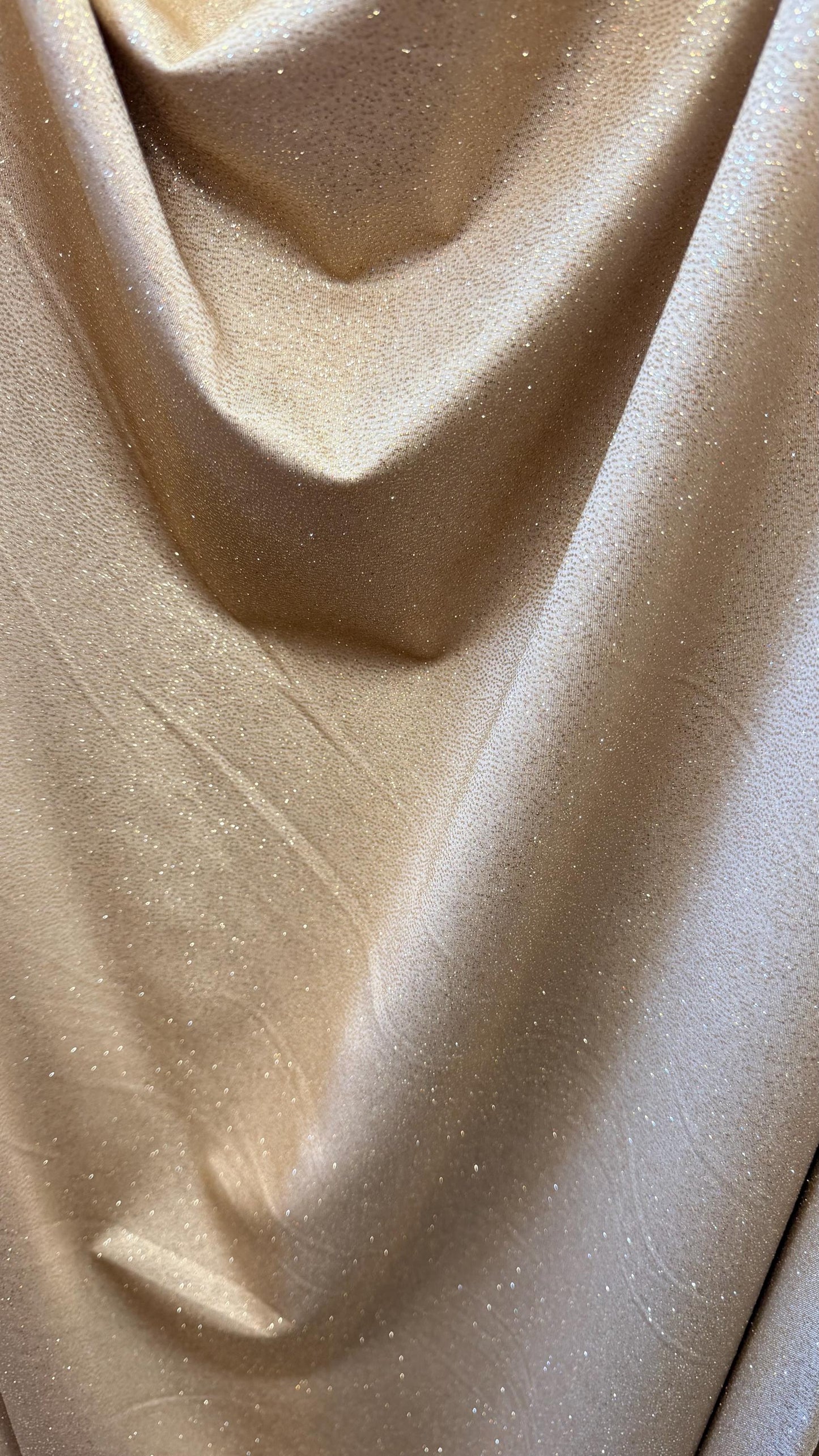 New Metallic Glitter Nylon Spandex Taupe/Gold 4way stretch 58/60"  Sold by the YD. Ships worldwide from Los Angeles California USA.