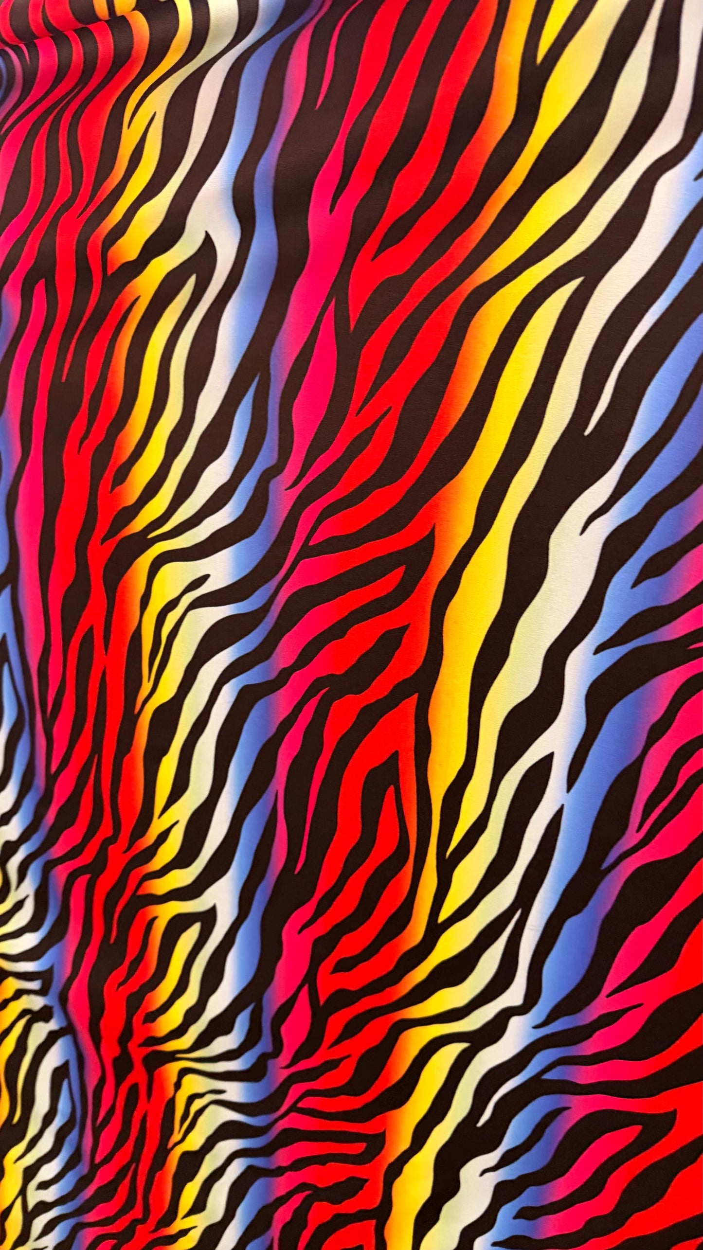 Rainbow zebra design print on nylon spandex 4way stretch 58/60" Sold by the YD. Ships worldwide from Los Angeles California USA.