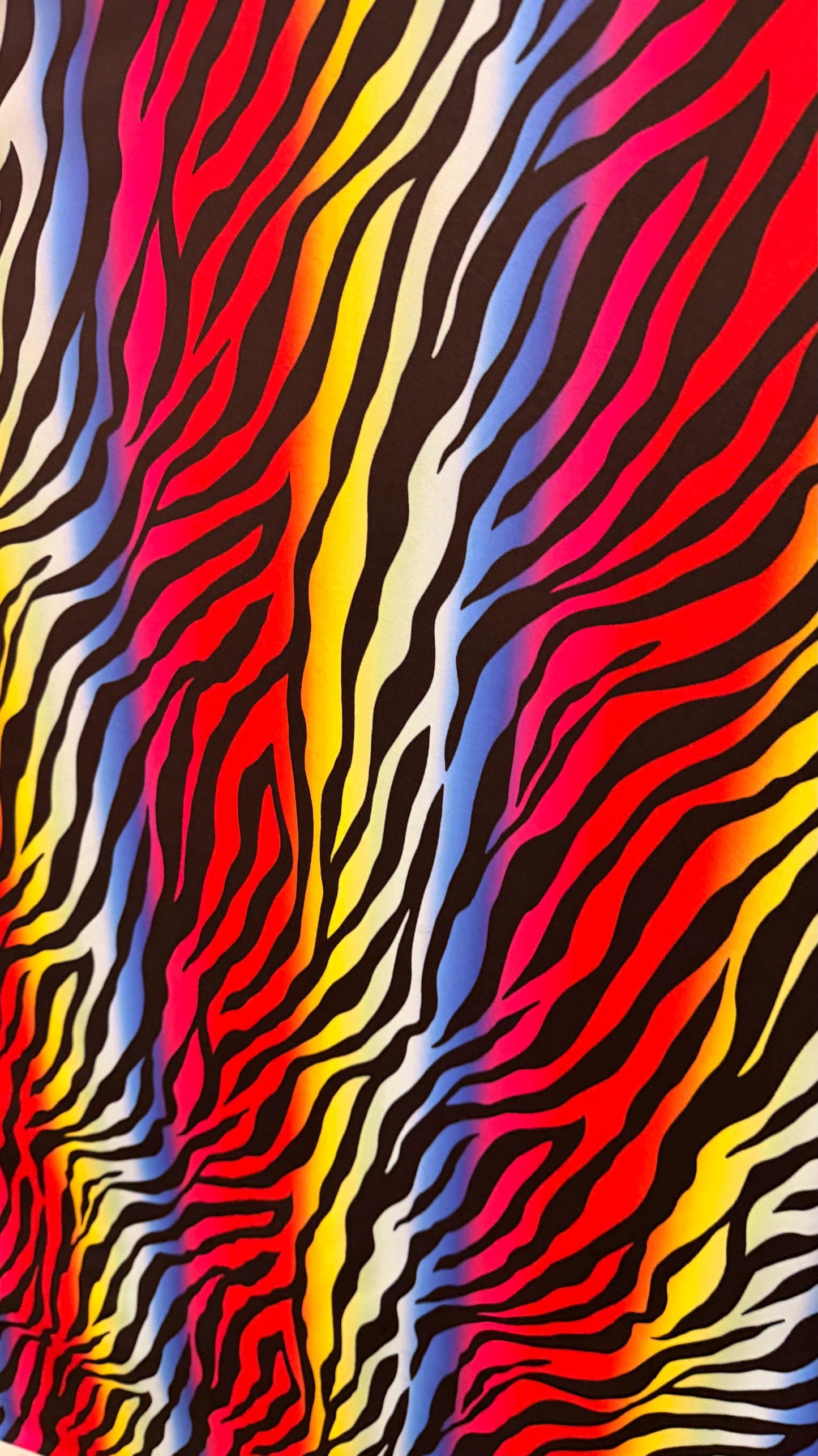 Rainbow zebra design print on nylon spandex 4way stretch 58/60" Sold by the YD. Ships worldwide from Los Angeles California USA.