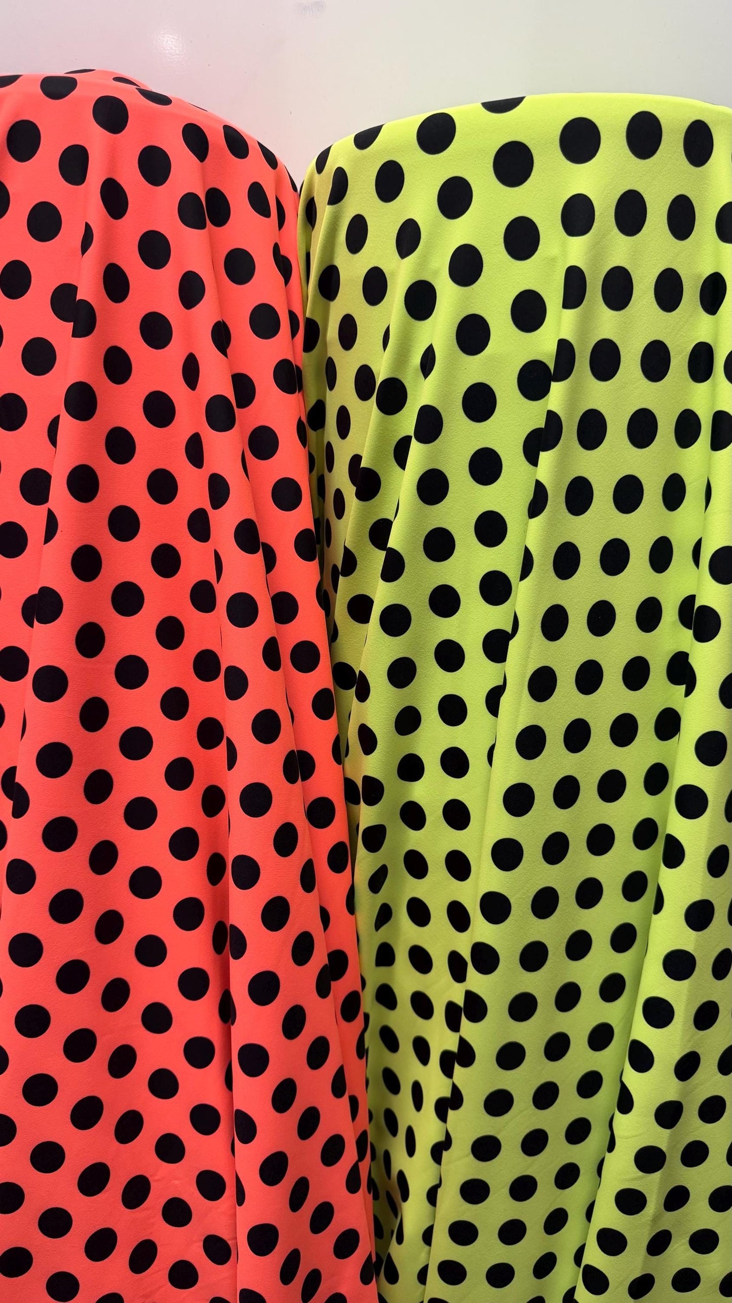 New polka dots design neon colors with black dots nylon spandex 4-way stretch 58/60” Sold by the YD. Ships worldwide from Los Angeles CA