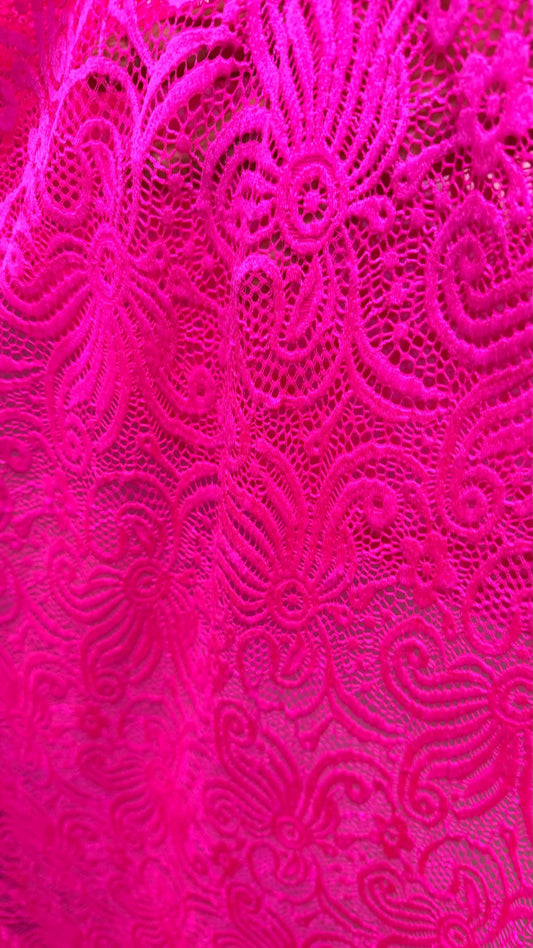 New Lace Swirl design Hot Pink Color nylon spandex lace 4way stretch 58/60" Sold by the YD. Ships worldwide from Los Angeles California USA.