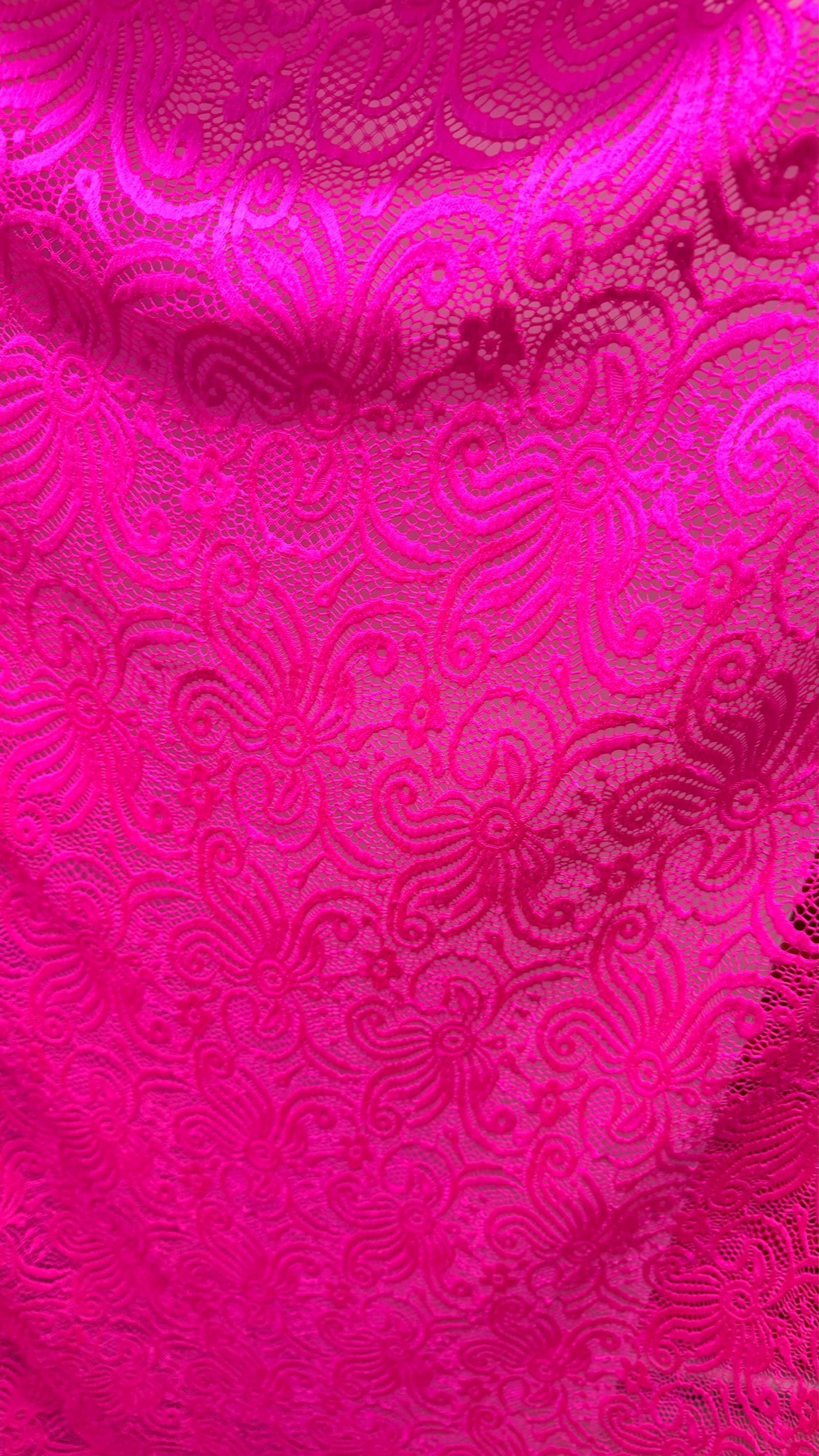 New Lace Swirl design Hot Pink Color nylon spandex lace 4way stretch 58/60" Sold by the YD. Ships worldwide from Los Angeles California USA.