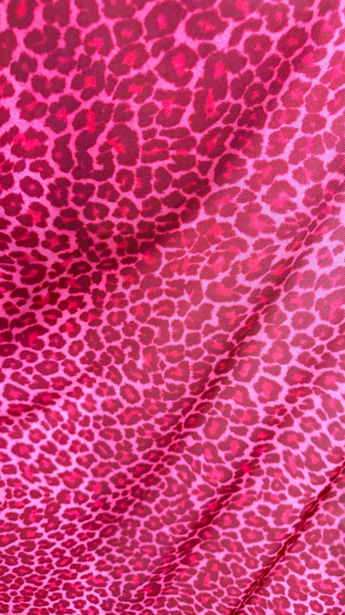 New Exotic leopard design Pink  print on power mesh 4-way stretch 58/60” Sold by the YD. Ships worldwide from Los Angeles California USA.