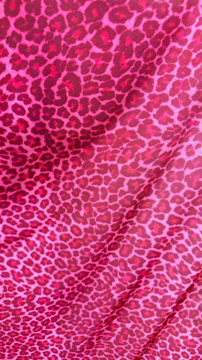New Exotic leopard design Pink  print on power mesh 4-way stretch 58/60” Sold by the YD. Ships worldwide from Los Angeles California USA.