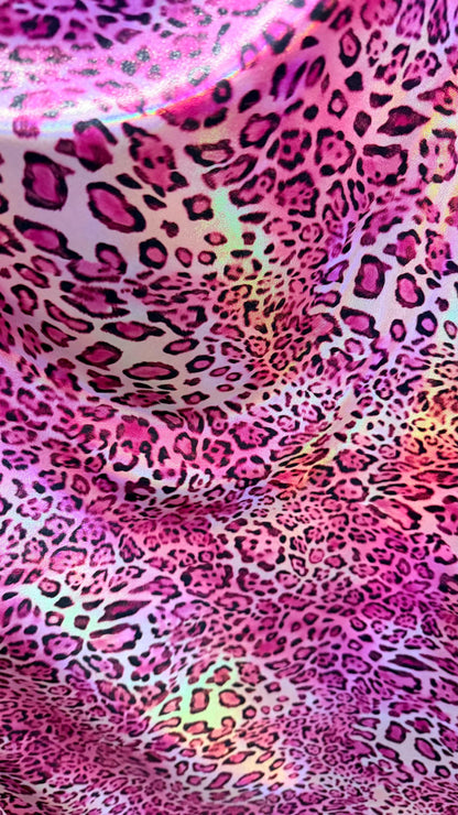 New exotic Iridescent Pug Leopard design hologram nylon spandex 4-way stretch 58/60” Sold by the YD. Ships worldwide from Los Angeles CA