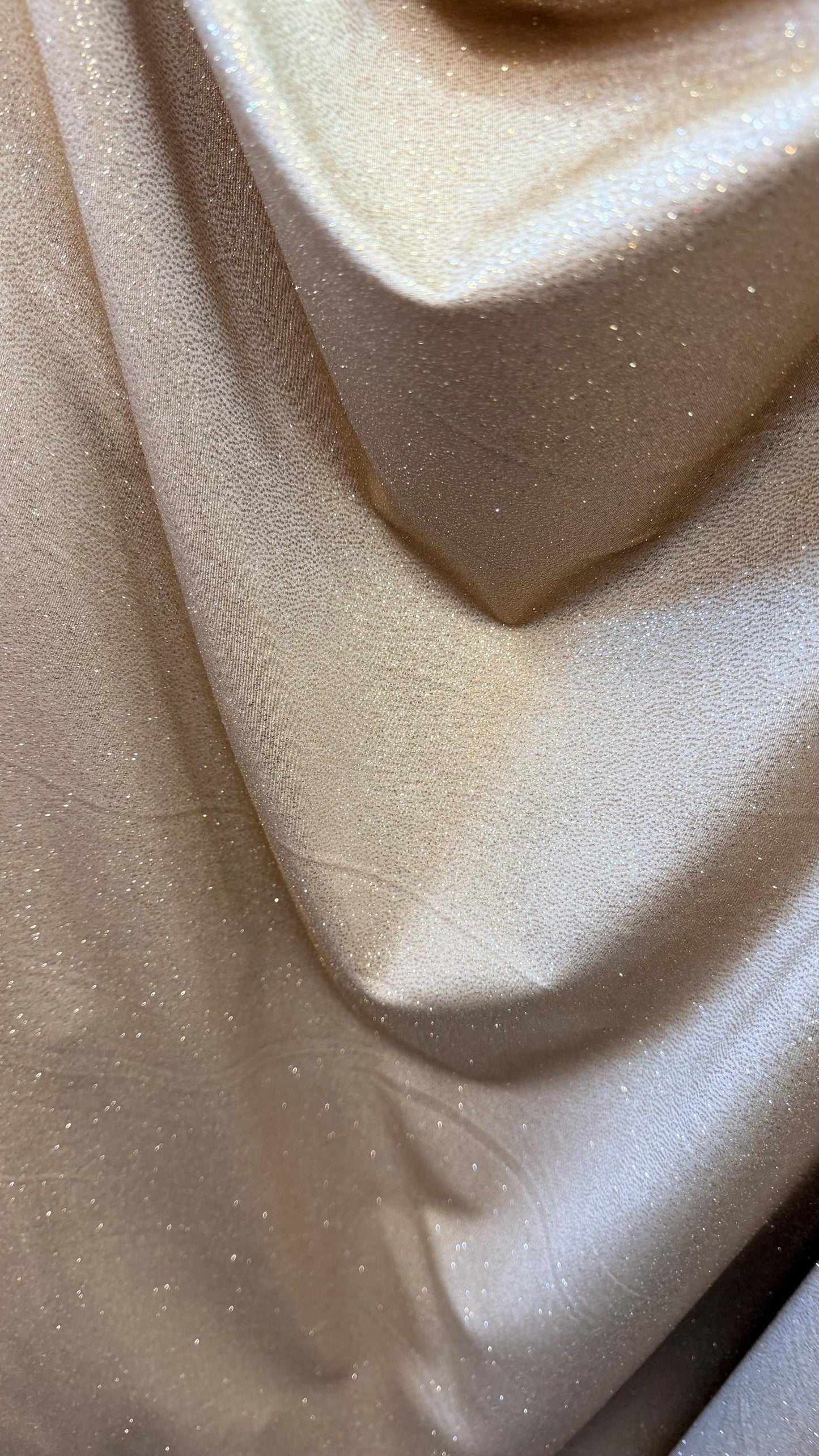 New Metallic Glitter Nylon Spandex Taupe/Gold 4way stretch 58/60"  Sold by the YD. Ships worldwide from Los Angeles California USA.