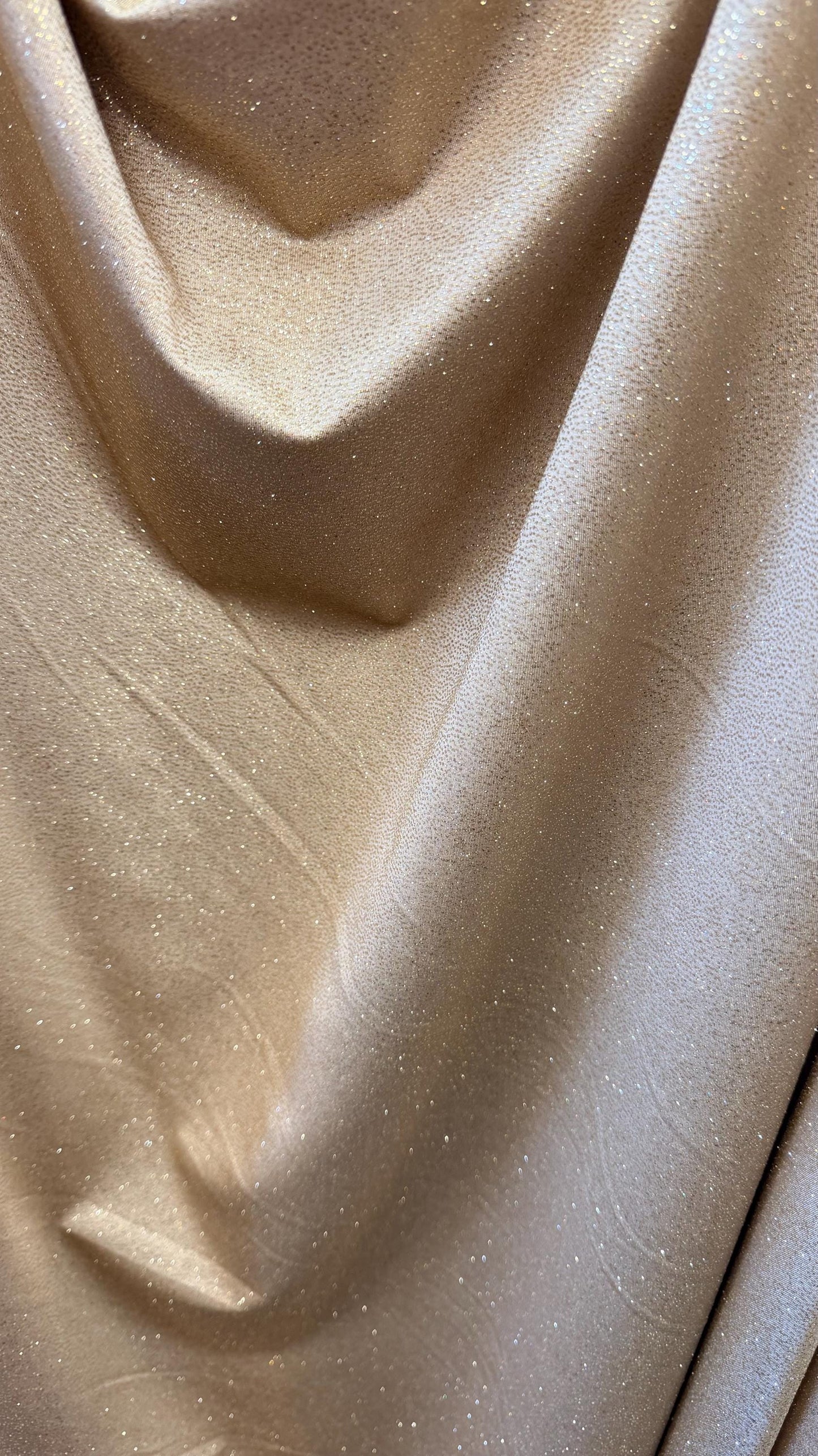 New Metallic Glitter Nylon Spandex Taupe/Gold 4way stretch 58/60"  Sold by the YD. Ships worldwide from Los Angeles California USA.