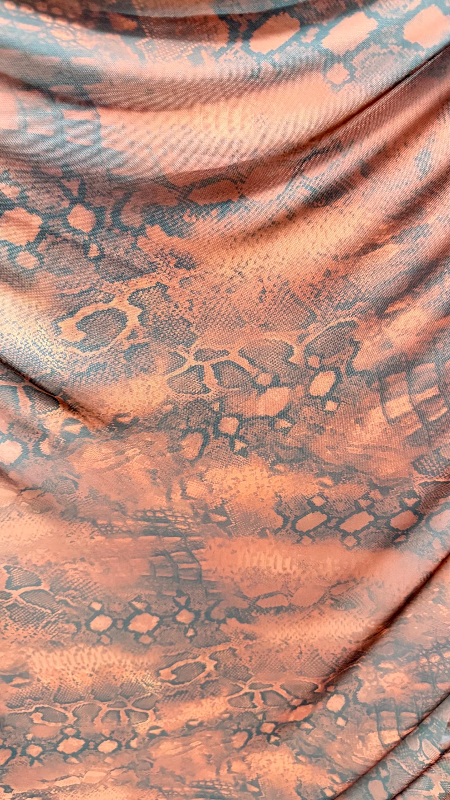 New Exotic snake design Rust/Black 4-way Stretch 58/60” Sold by the YD. Ships worldwide from Los Ángeles California USA