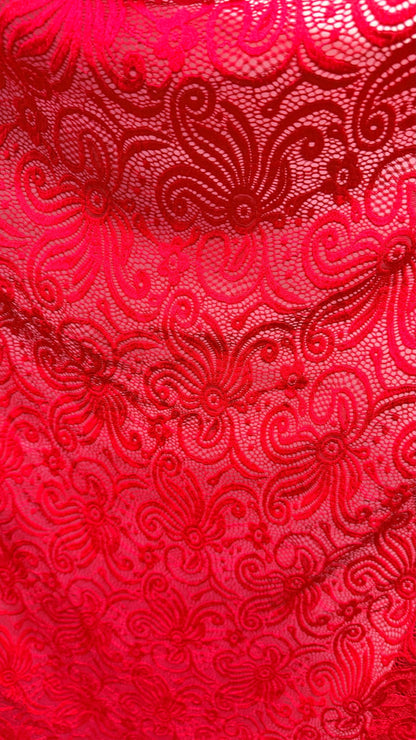 New Lace Swirl design Red Color nylon spandex lace 4way stretch 58/60" Sold by the YD. Ships worldwide from Los Angeles California USA.