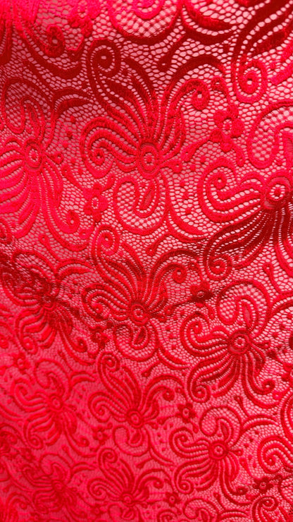 New Lace Swirl design Red Color nylon spandex lace 4way stretch 58/60" Sold by the YD. Ships worldwide from Los Angeles California USA.
