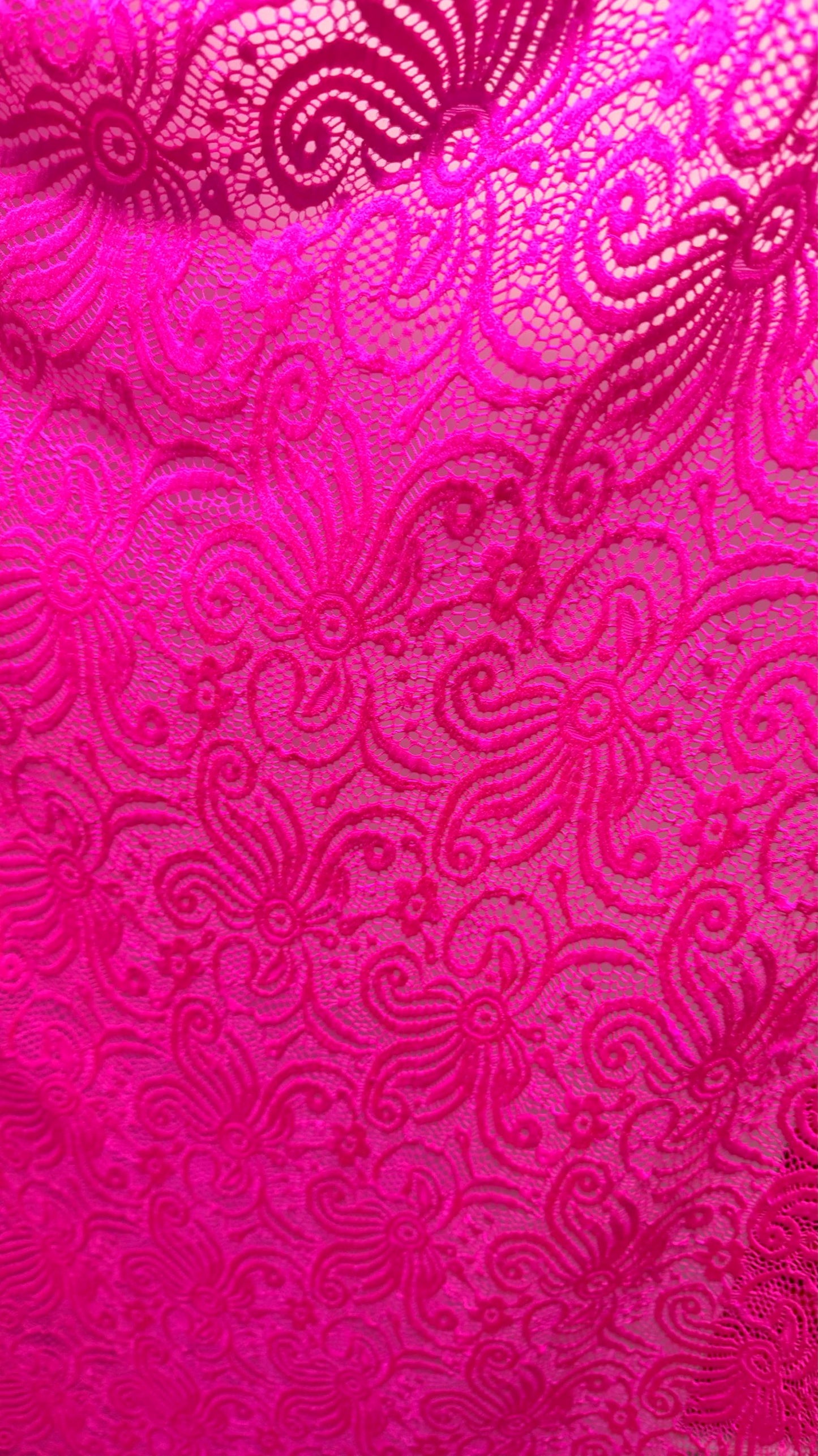 New Lace Swirl design Hot Pink Color nylon spandex lace 4way stretch 58/60" Sold by the YD. Ships worldwide from Los Angeles California USA.