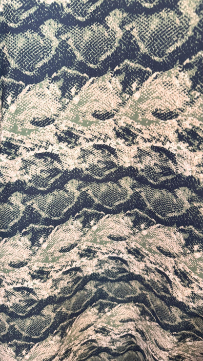 New Boa snake design print on heavy nylon spandex 4way stretch 58/60" Sold by the YD. Ships worldwide from Los Angeles California USA.