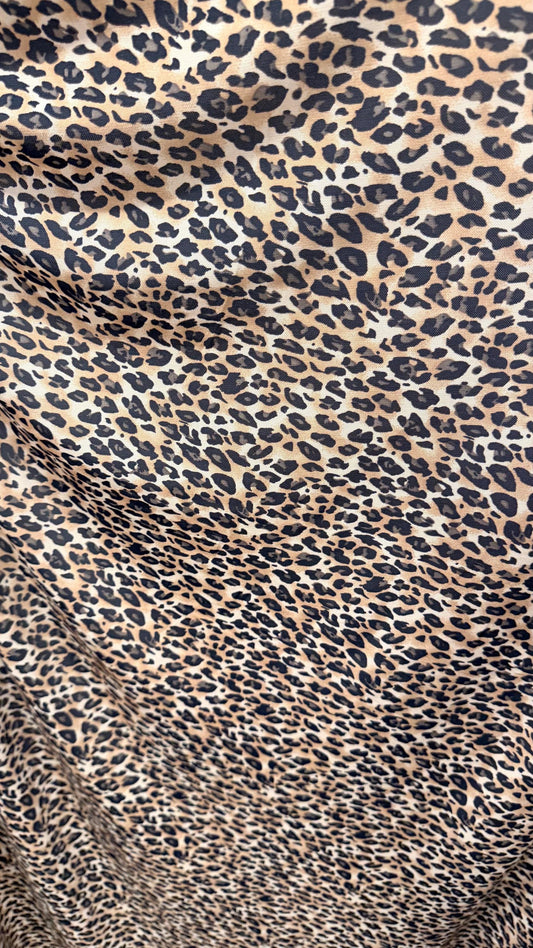 New Exotic Cheetah design print on nylon power mesh 4way stretch 58/60” Sold by the YD. Ships worldwide from Los Angeles California USA.