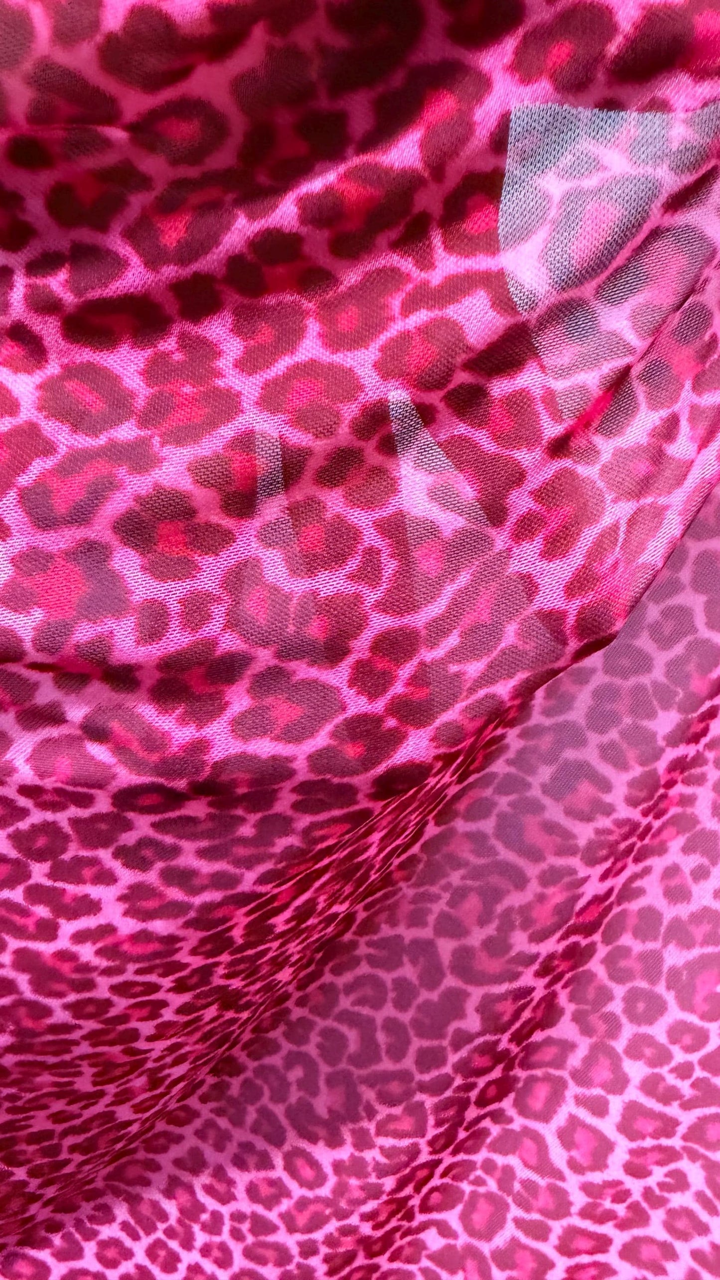 New Exotic leopard design Pink  print on power mesh 4-way stretch 58/60” Sold by the YD. Ships worldwide from Los Angeles California USA.