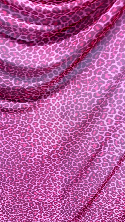 New Exotic leopard design Pink  print on power mesh 4-way stretch 58/60” Sold by the YD. Ships worldwide from Los Angeles California USA.