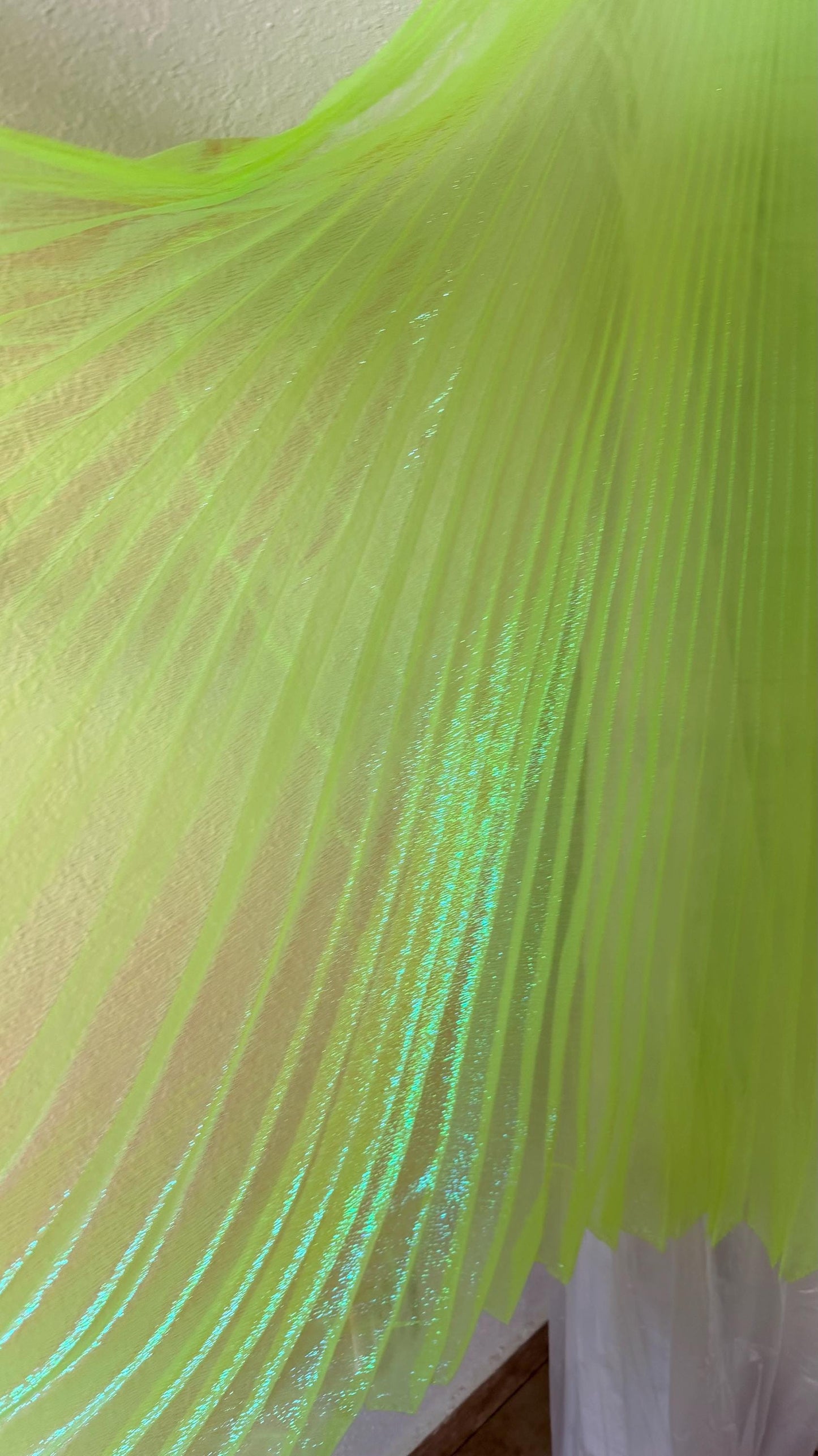 Sunburst pleated Iridescent metallic organza Wing Style 108” length by 56” width Sold by the PC ships worldwide from Los Angeles California