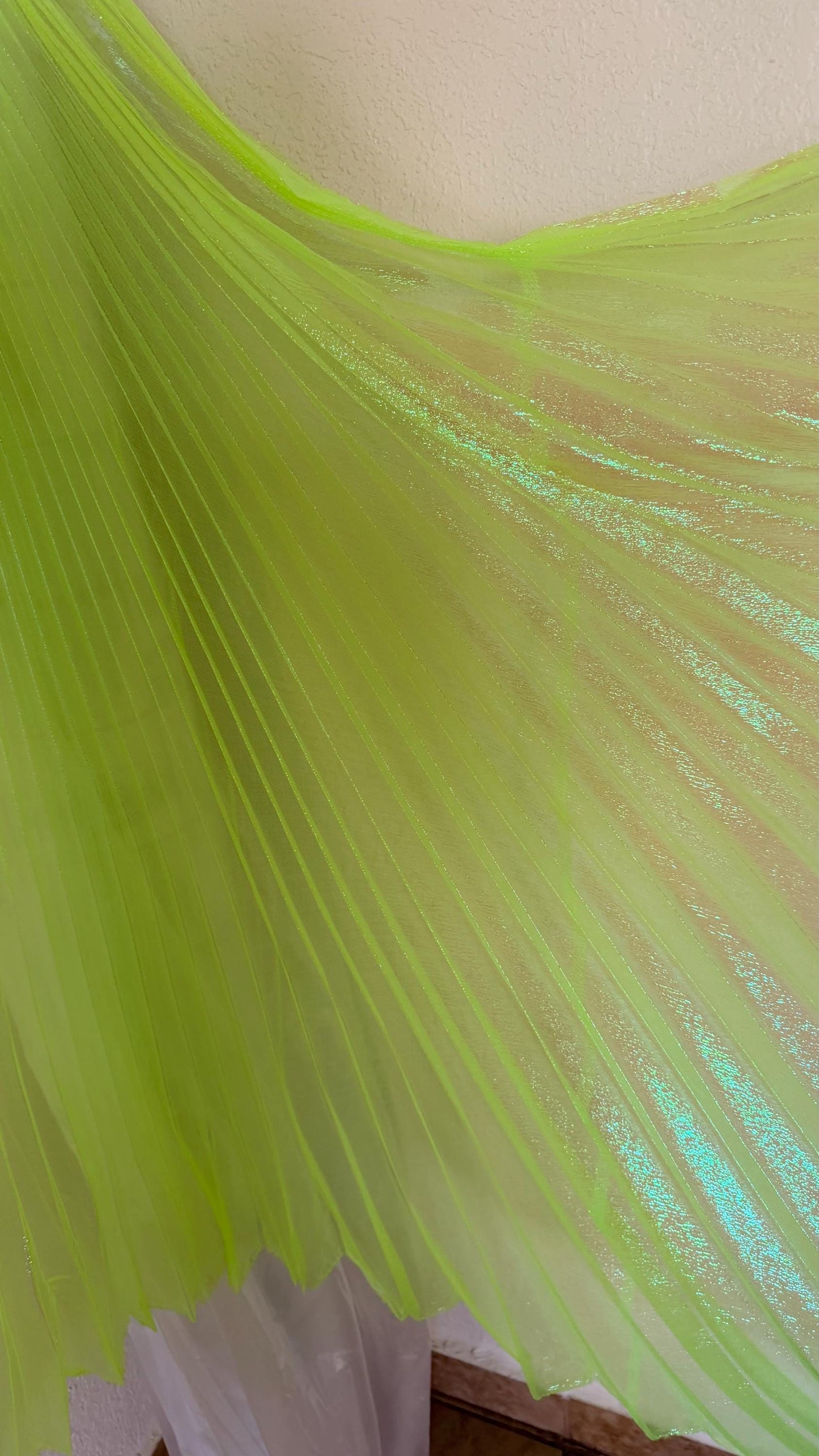 Sunburst pleated Iridescent metallic organza Wing Style 108” length by 56” width Sold by the PC ships worldwide from Los Angeles California