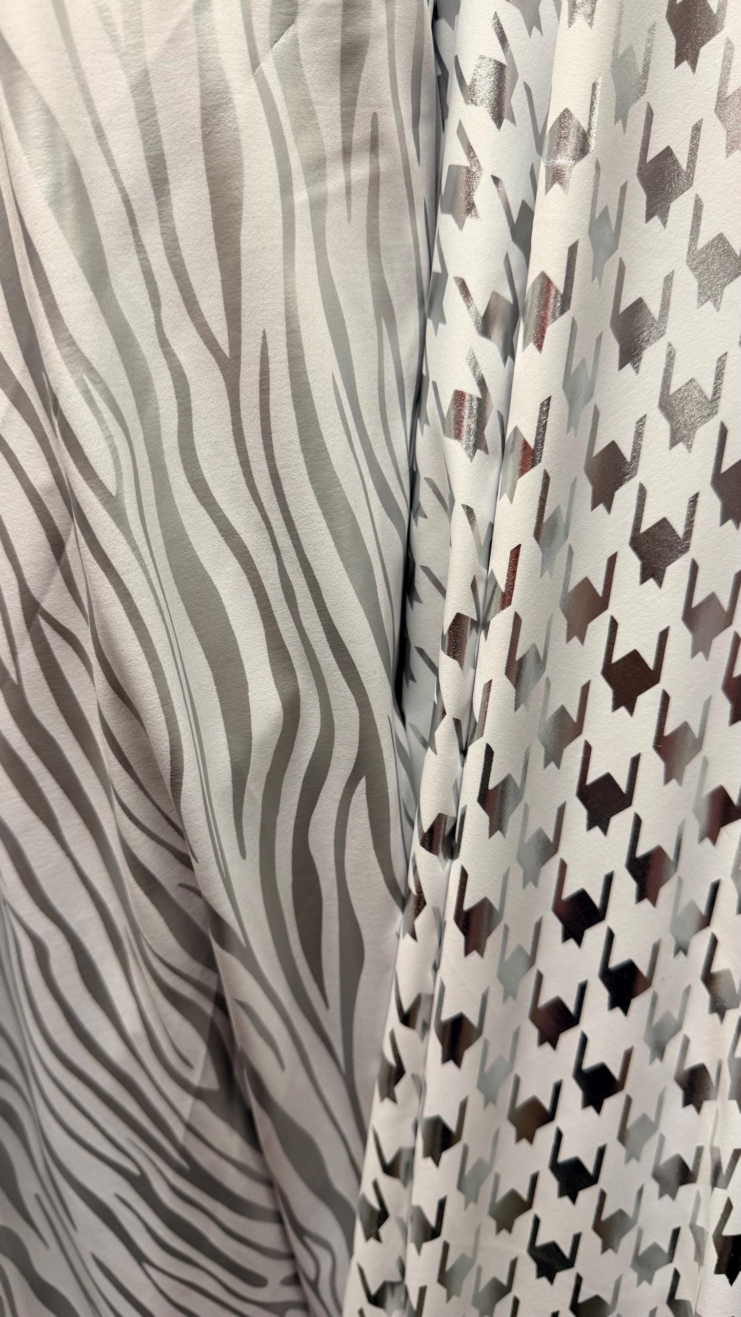 New Houndstooth & Zebra  design White/Silver metallic nylon spandex 4way stretch 58/60" Sold by the YD. Ships worldwide from Los Angeles CA