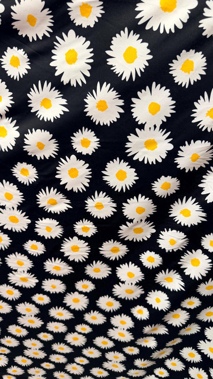 New Daisy flower design Black/white/yellow print on great quality of nylon spandex 4-way stretch 58/60” Sold by the YD.