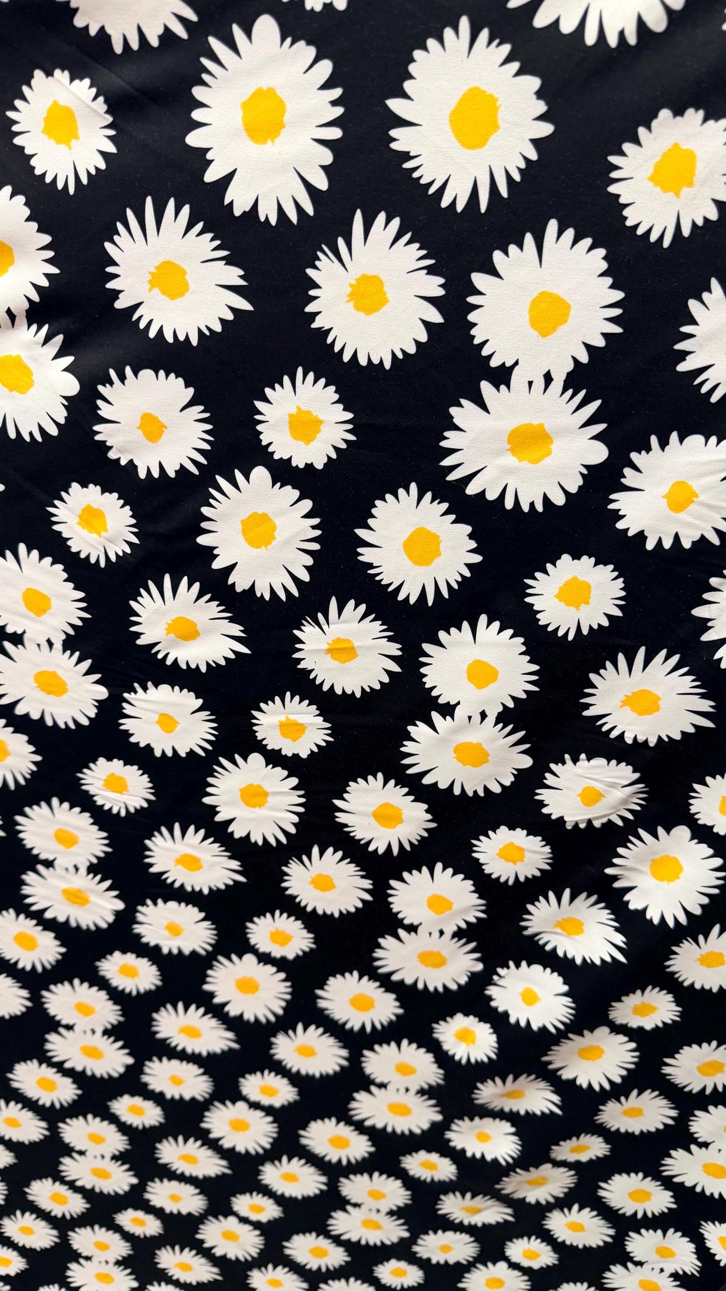 New Daisy flower design Black/white/yellow print on great quality of nylon spandex 4-way stretch 58/60” Sold by the YD.