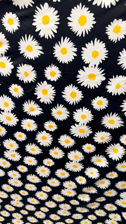 New Daisy flower design Black/white/yellow print on great quality of nylon spandex 4-way stretch 58/60” Sold by the YD.