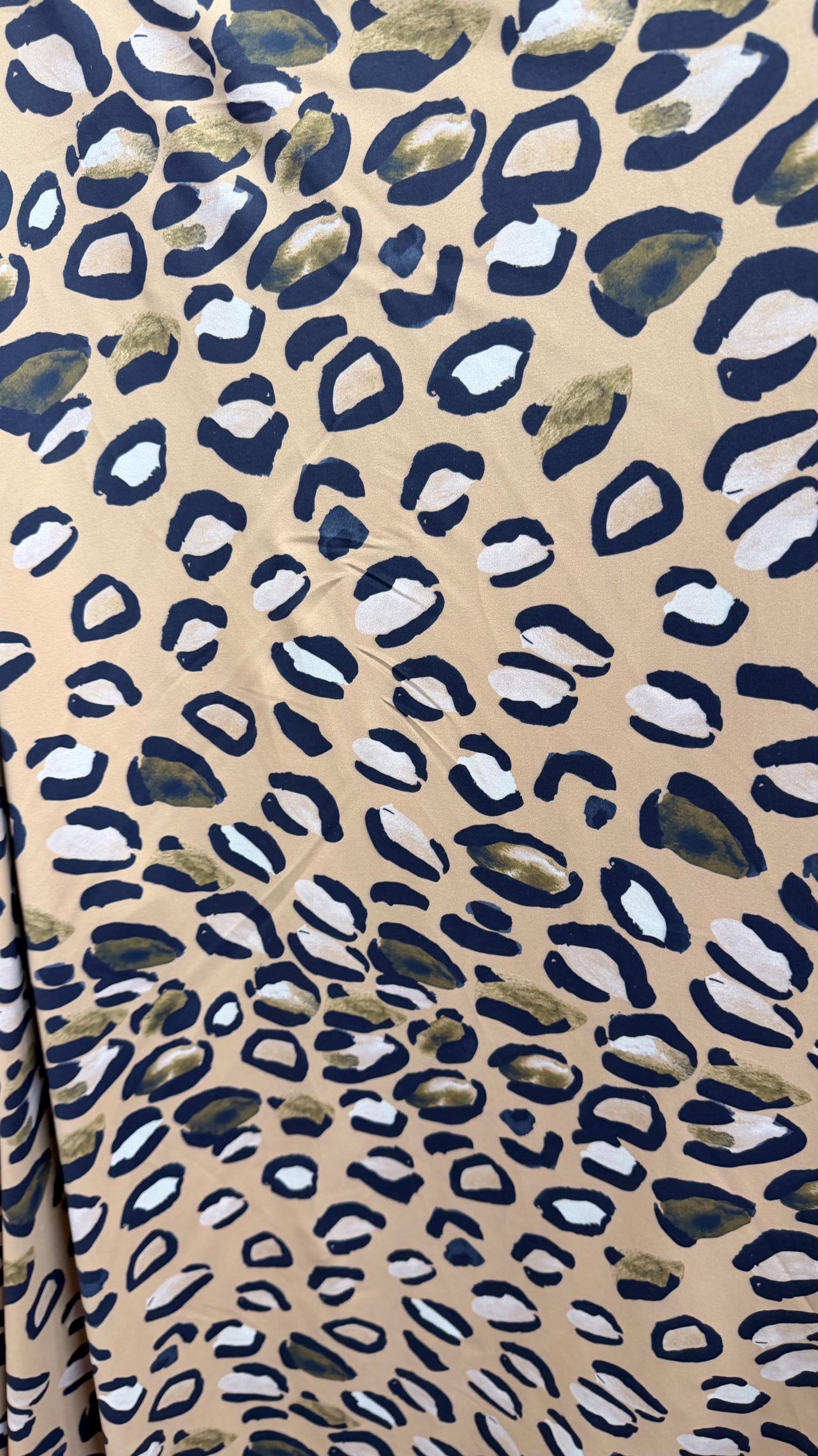 New Leopard design Taupe/Multi  print on nylon spandex 4way stretch 58/60" Sold by the YD. Ships worldwide from Los Angeles California USA.