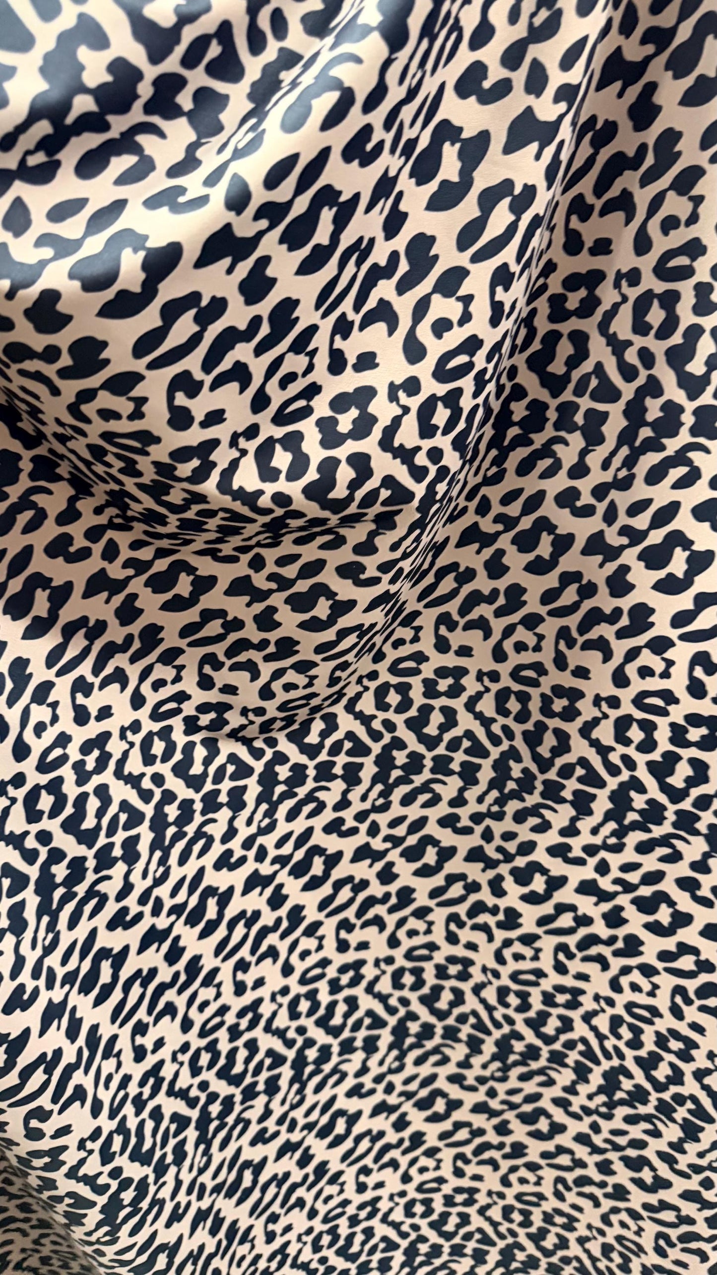 New Exotic Leopard design Taupe/Black print on nylon spandex 4way stretch 58/60" Sold by the YD. Ships worldwide from Los Angeles CA