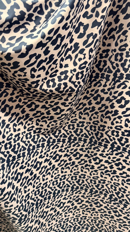 New Exotic Leopard design Taupe/Black print on nylon spandex 4way stretch 58/60" Sold by the YD. Ships worldwide from Los Angeles CA