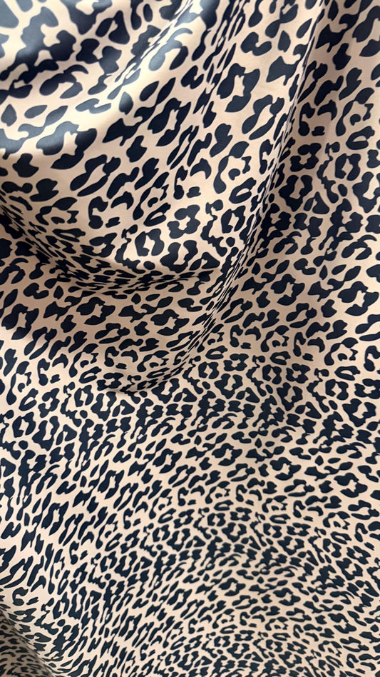 New Exotic Leopard design Taupe/Black print on nylon spandex 4way stretch 58/60" Sold by the YD. Ships worldwide from Los Angeles CA