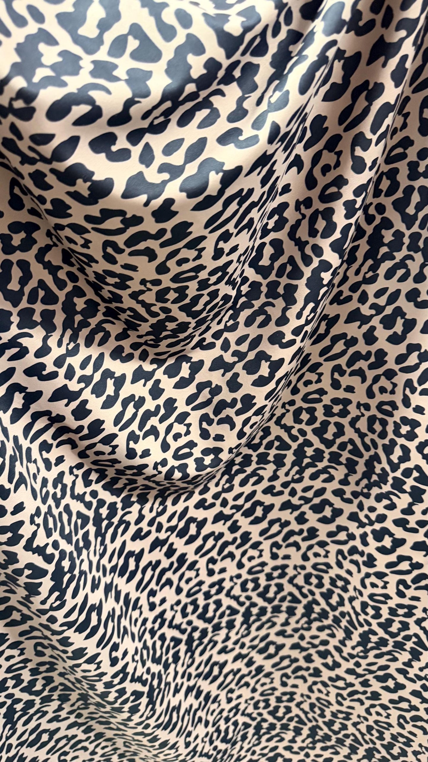 New Exotic Leopard design Taupe/Black print on nylon spandex 4way stretch 58/60" Sold by the YD. Ships worldwide from Los Angeles CA