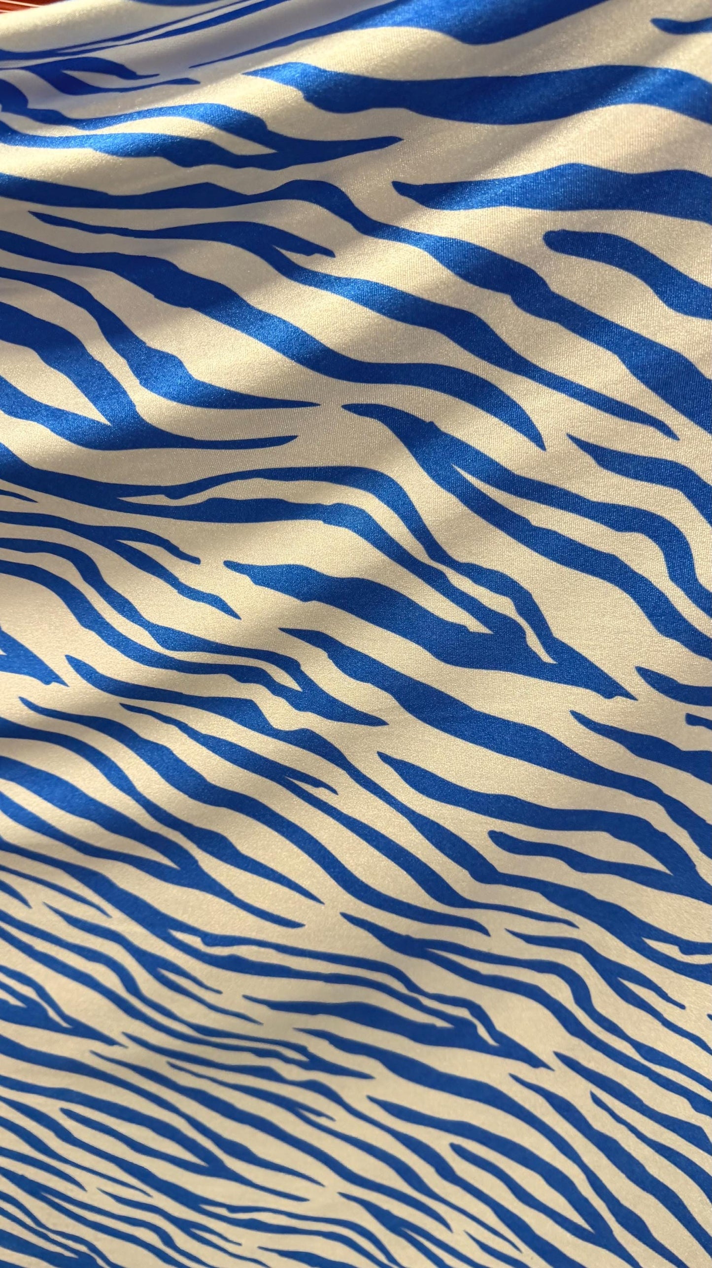New Exotic Zebra design Taupe/Black print on nylon spandex 4way stretch 58/60" Sold by the YD. Ships worldwide from Los Angeles California