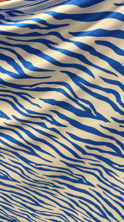 New Exotic Zebra design Taupe/Black print on nylon spandex 4way stretch 58/60" Sold by the YD. Ships worldwide from Los Angeles California
