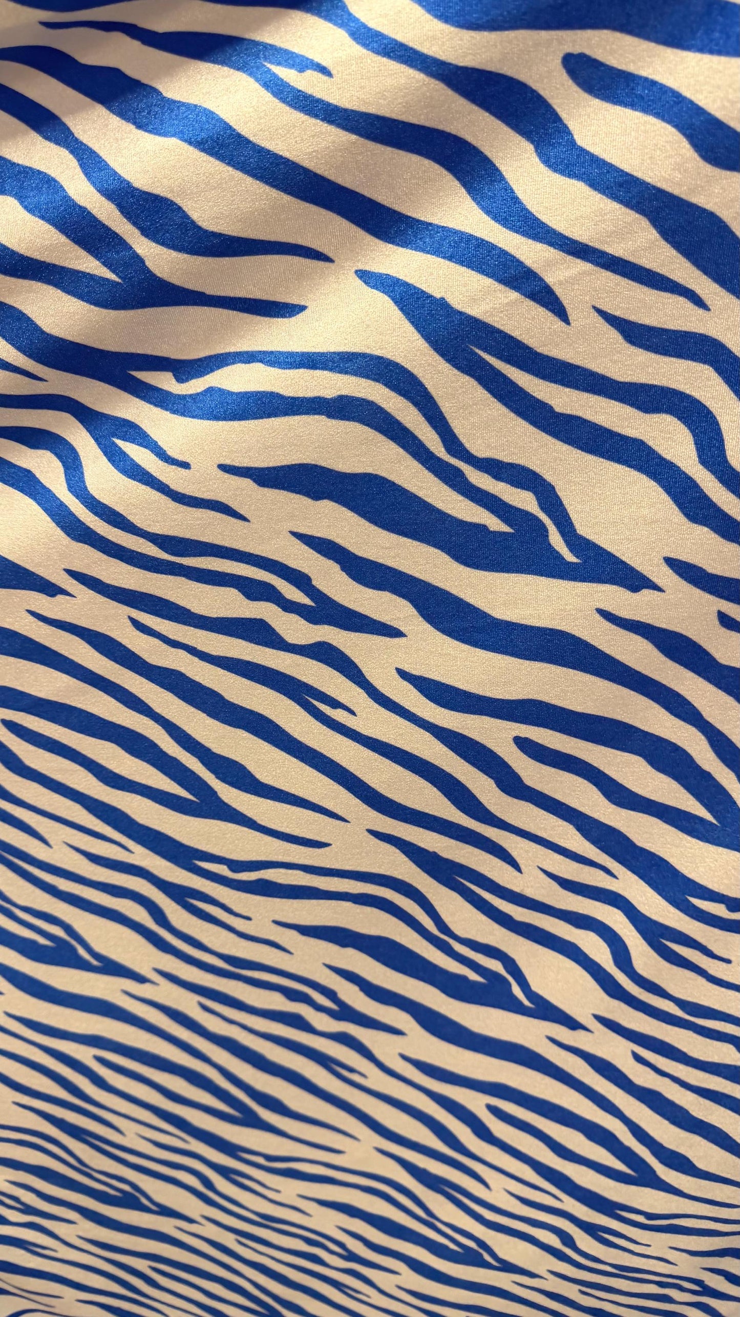 New Exotic Zebra design Taupe/Black print on nylon spandex 4way stretch 58/60" Sold by the YD. Ships worldwide from Los Angeles California