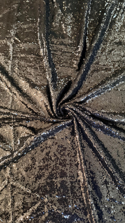 Mini cosmic glitz shiny sequins on strech mesh 2way strech 55/57" Sold by the YD. Ships worldwide from Los Angeles California USA