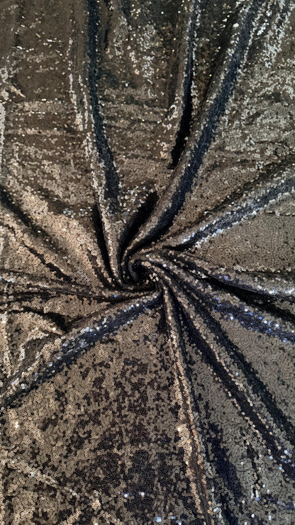 Mini cosmic glitz shiny sequins on strech mesh 2way strech 55/57" Sold by the YD. Ships worldwide from Los Angeles California USA